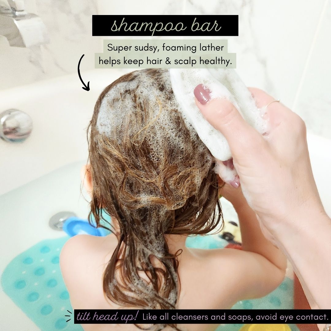 mom and baby in bath washing hair with tiny human supply shampoo bar
